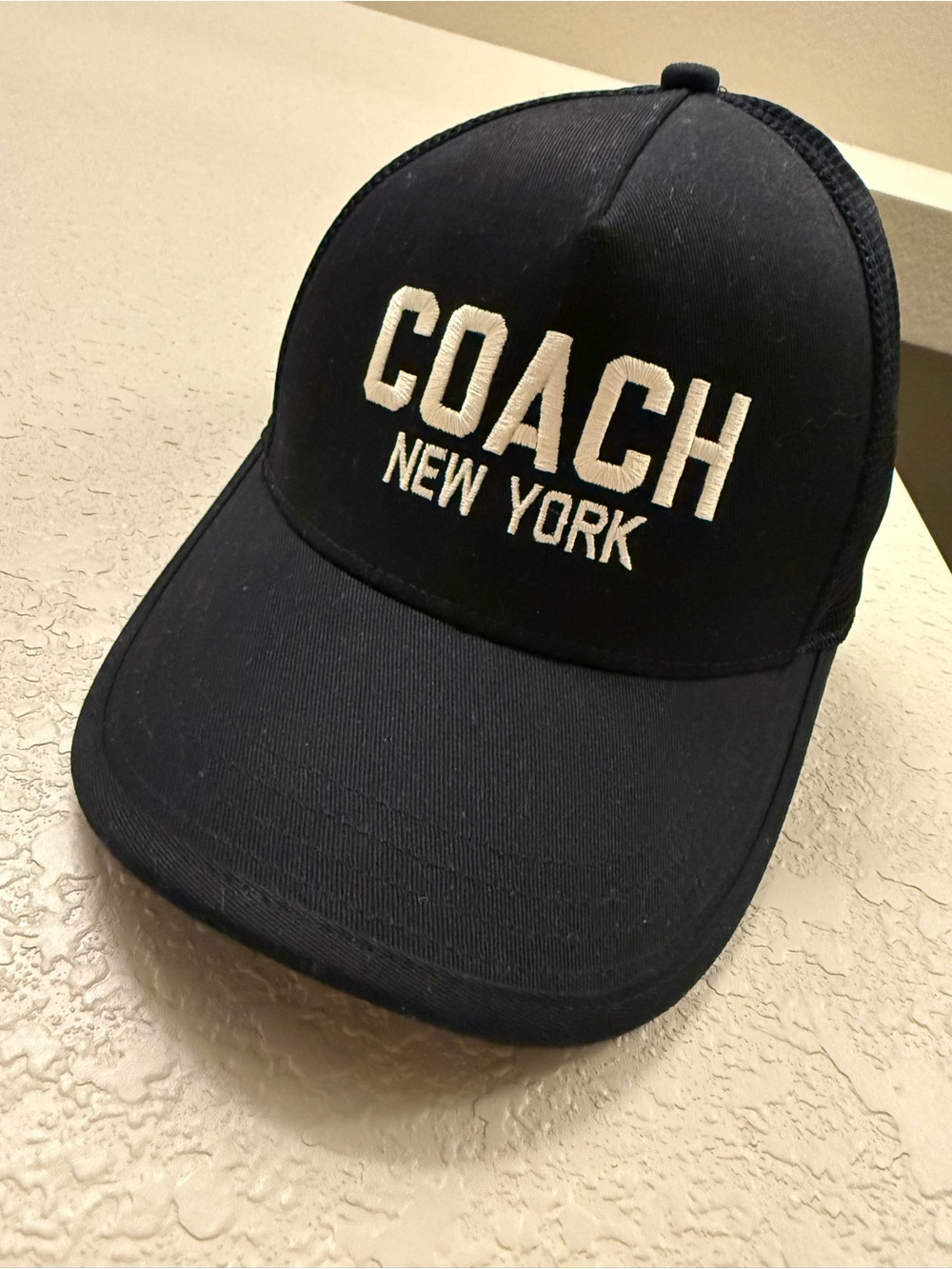 Coach Black Trucker Cap with White Embroidered Logo